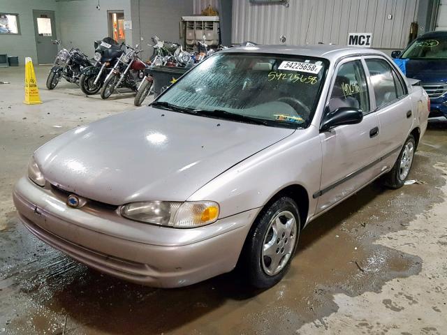 1Y1SK5280YZ425529 - 2000 CHEVROLET GEO PRIZM BEIGE photo 2