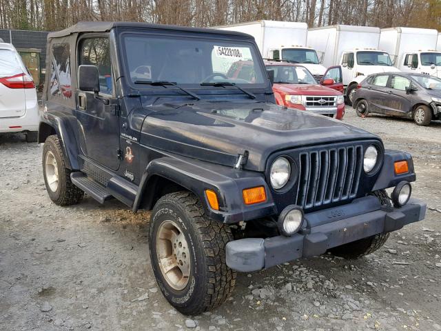 1J4FA59S5YP721517 - 2000 JEEP WRANGLER / BLACK photo 1