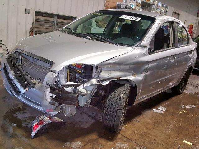 KL1TD5DEXBB140673 - 2011 CHEVROLET AVEO LS SILVER photo 9