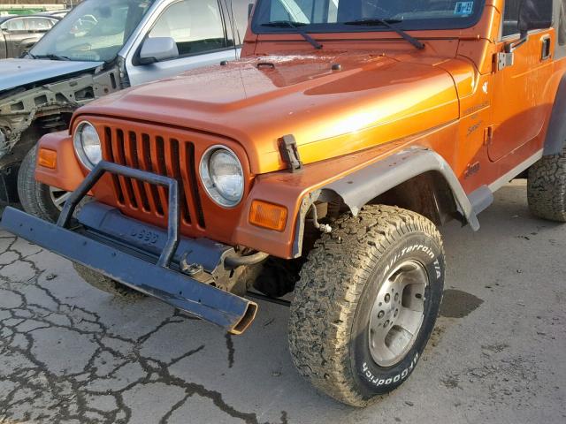 1J4FA49SX1P352394 - 2001 JEEP WRANGLER / ORANGE photo 9