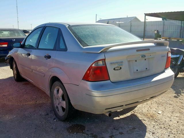 1FAFP34N35W242403 - 2005 FORD FOCUS ZX4 SILVER photo 3