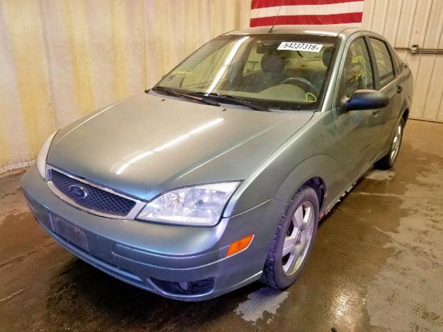 1FAFP34N35W179139 - 2005 FORD FOCUS ZX4 GREEN photo 2