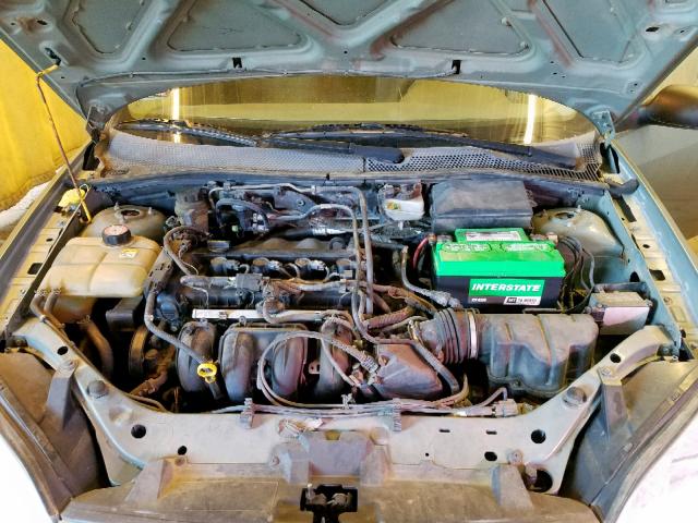 1FAFP34N35W179139 - 2005 FORD FOCUS ZX4 GREEN photo 7