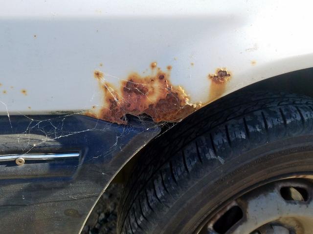 1Y1SK5166LZ053865 - 1990 GEO PRIZM BASE WHITE photo 9