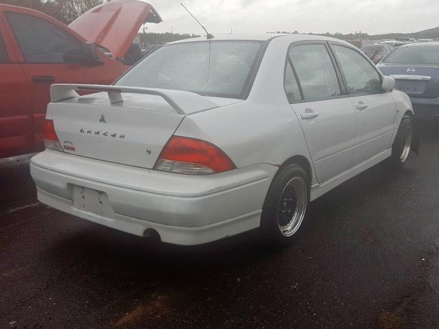 JA3AJ86E52U006924 - 2002 MITSUBISHI LANCER OZ WHITE photo 4