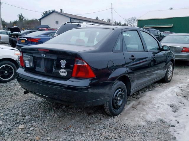 1FAHP34N87W148934 - 2007 FORD FOCUS ZX4 BLACK photo 4