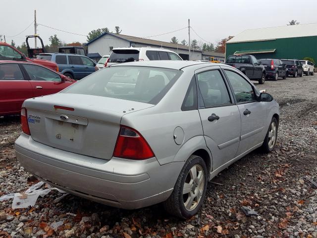 1FAHP34N47W364604 - 2007 FORD FOCUS ZX4 GRAY photo 4