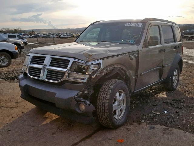 1D8GU28KX7W581875 - 2007 DODGE NITRO SXT BEIGE photo 2