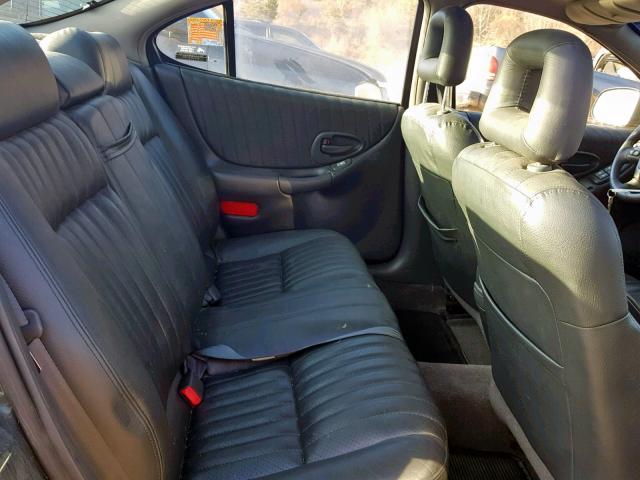 1G2WP52K6XF272677 - 1999 PONTIAC GRAND PRIX GREEN photo 6