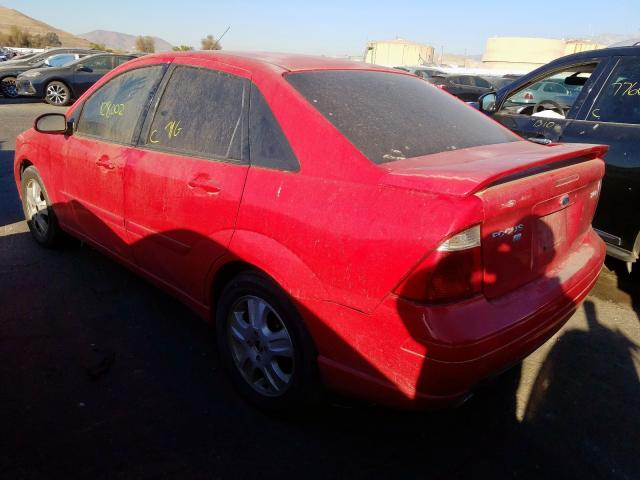 1FAFP38Z75W260643 - 2005 FORD FOCUS ZX4 RED photo 3