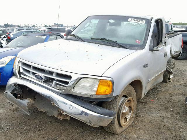 2FTRF17294CA94736 - 2004 FORD F-150 HERI SILVER photo 2