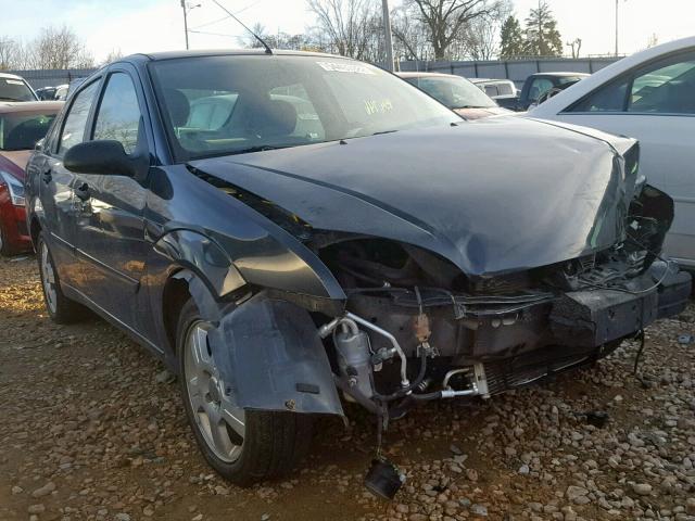 1FAHP34N55W154865 - 2005 FORD FOCUS ZX4 BLACK photo 1