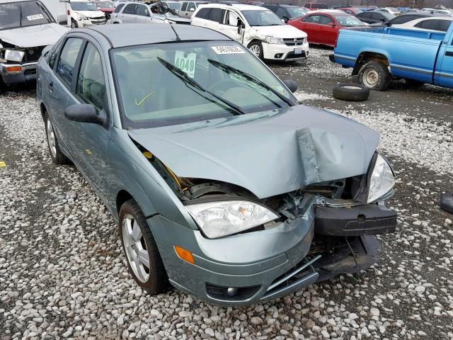 1FAFP34N66W126582 - 2006 FORD FOCUS ZX4 SILVER photo 1