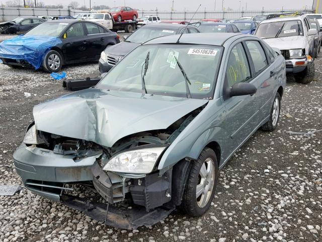 1FAFP34N66W126582 - 2006 FORD FOCUS ZX4 SILVER photo 2