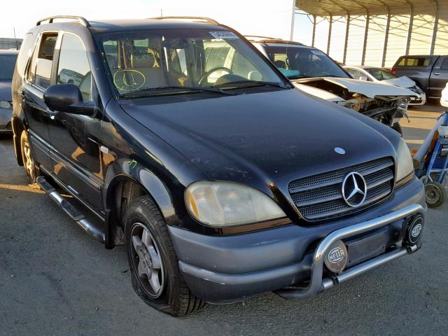 4JGAB54E8XA140962 - 1999 MERCEDES-BENZ ML 320 BLACK photo 1