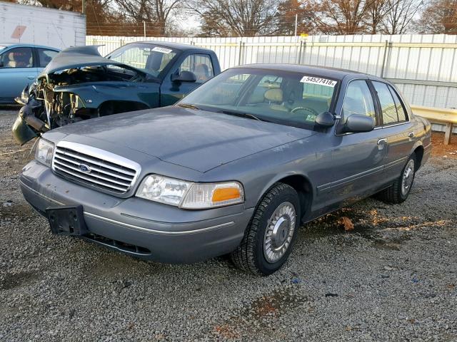 2FAFP71W4XX133881 - 1999 FORD CROWN VICT GRAY photo 2