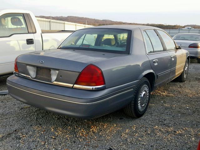 2FAFP71W4XX133881 - 1999 FORD CROWN VICT GRAY photo 4