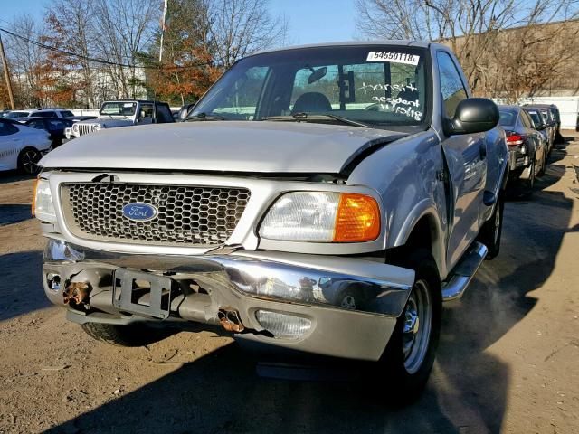 2FTRF08254CA28628 - 2004 FORD F-150 HERI SILVER photo 2