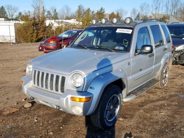 1J4GL38K02W347710 - 2002 JEEP LIBERTY RE SILVER photo 2