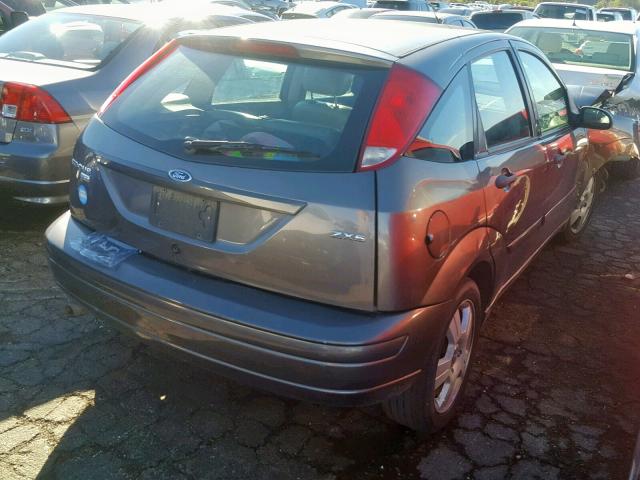 1FAFP37N36W208135 - 2006 FORD FOCUS ZX5 GRAY photo 4