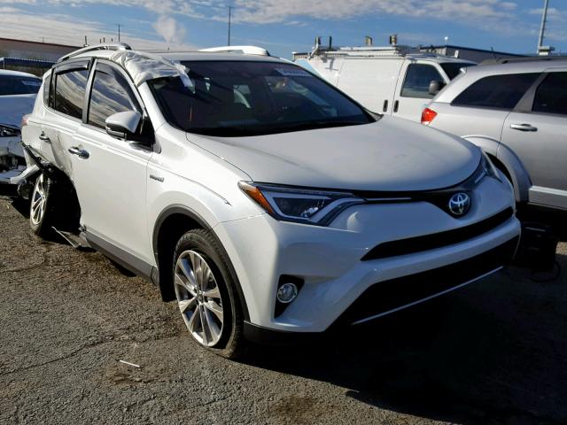 JTMDJREV3JD194217 - 2018 TOYOTA RAV4 HV LI WHITE photo 1