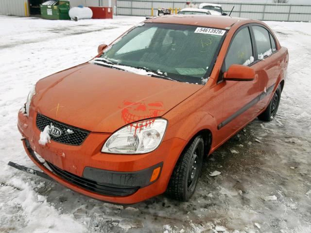 KNADE223496574243 - 2009 KIA RIO BASE ORANGE photo 2