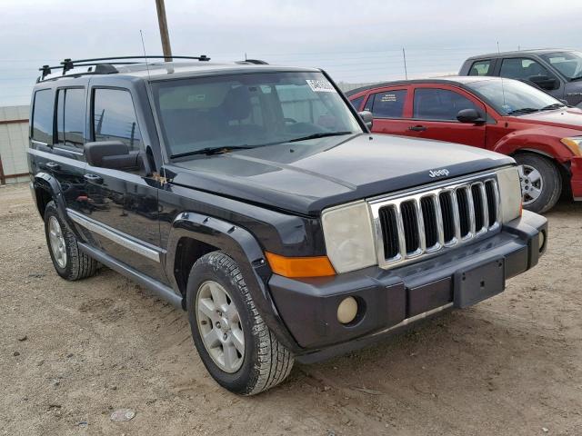 1J8HH58266C293899 - 2006 JEEP COMMANDER BLACK photo 1