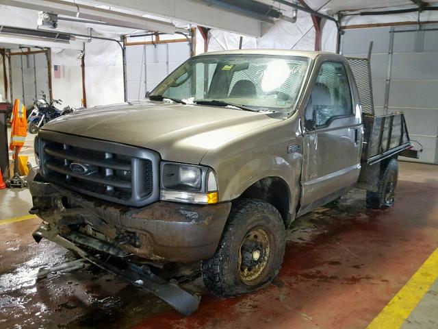 1FTSF31PX4EC72391 - 2004 FORD F350 SRW S TAN photo 2