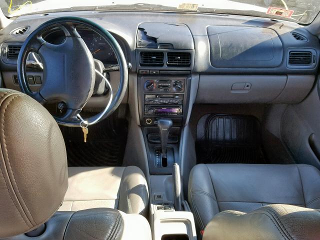JF1SF6556XH741785 - 1999 SUBARU FORESTER S WHITE photo 9