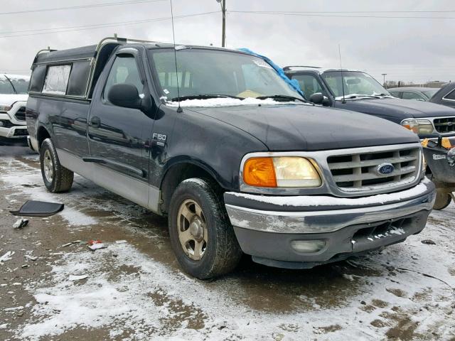 2FTRF17W44CA39811 - 2004 FORD F-150 HERI BLACK photo 1