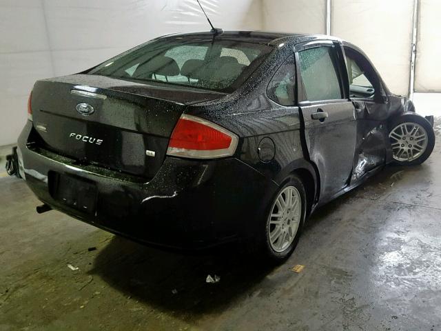 1FAHP3FN0BW100771 - 2011 FORD FOCUS BLACK photo 4