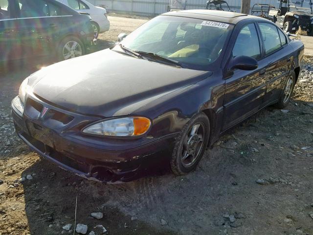 1G2NW52E52M716516 - 2002 PONTIAC GRAND AM G BLACK photo 2