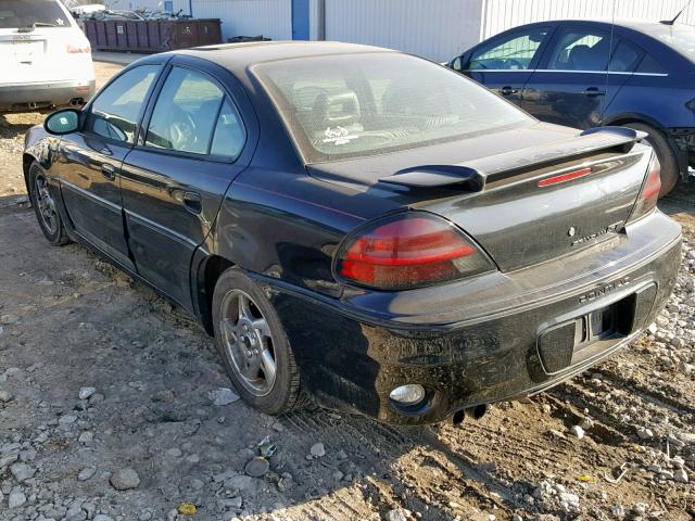 1G2NW52E52M716516 - 2002 PONTIAC GRAND AM G BLACK photo 3