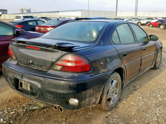 1G2NW52E52M716516 - 2002 PONTIAC GRAND AM G BLACK photo 4