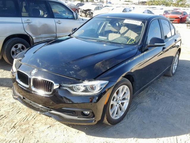 WBA8E5G59JNV03059 - 2018 BMW 320 XI BLACK photo 2