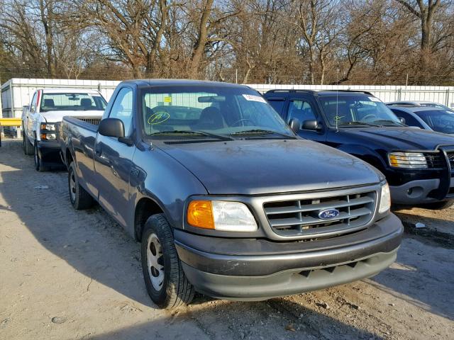 2FTRF17214CA09906 - 2004 FORD F-150 HERI GRAY photo 1