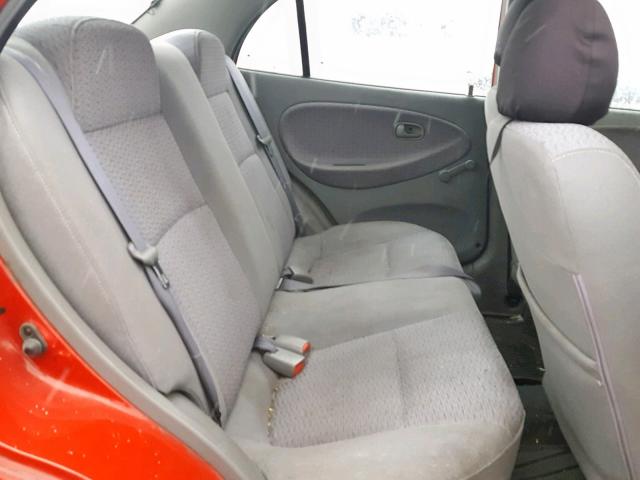 KNADC123426192509 - 2002 KIA RIO RED photo 6