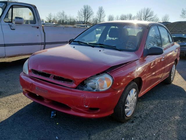 KNADC123526192616 - 2002 KIA RIO RED photo 2