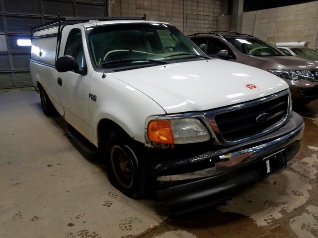 2FTRF17264CA30878 - 2004 FORD F-150 HERI WHITE photo 1