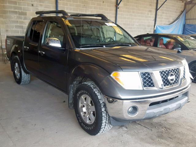 1N6AD07U86C454471 - 2006 NISSAN FRONTIER C GRAY photo 1