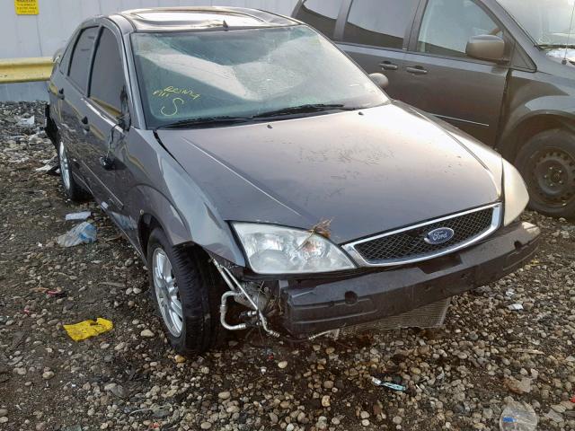 1FAHP34N17W306515 - 2007 FORD FOCUS ZX4 GRAY photo 1