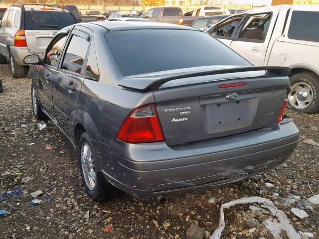 1FAHP34N17W306515 - 2007 FORD FOCUS ZX4 GRAY photo 3