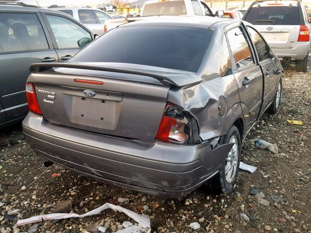 1FAHP34N17W306515 - 2007 FORD FOCUS ZX4 GRAY photo 4