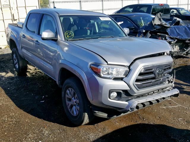 3TMAZ5CN2JM064585 - 2018 TOYOTA TACOMA DOU SILVER photo 1