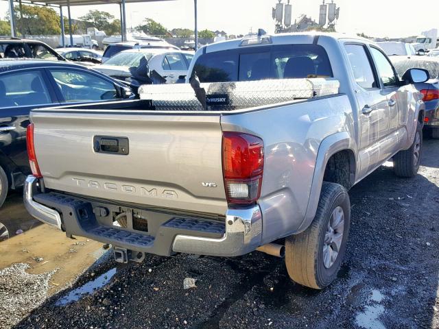 3TMAZ5CN2JM064585 - 2018 TOYOTA TACOMA DOU SILVER photo 4