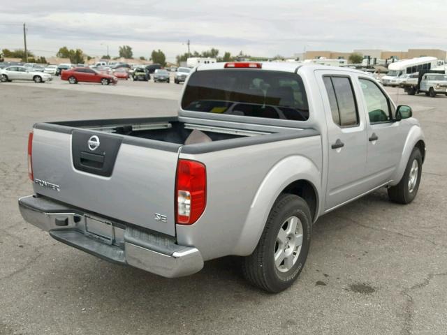 1N6AD07U46C476659 - 2006 NISSAN FRONTIER C SILVER photo 4