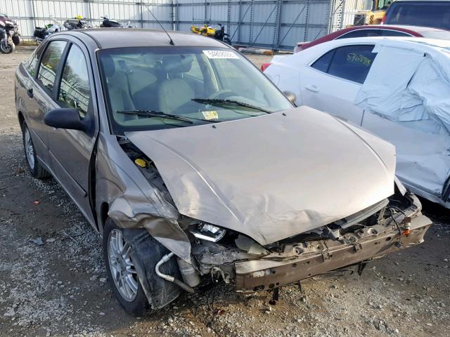 1FAFP34NX5W248490 - 2005 FORD FOCUS ZX4 TAN photo 1