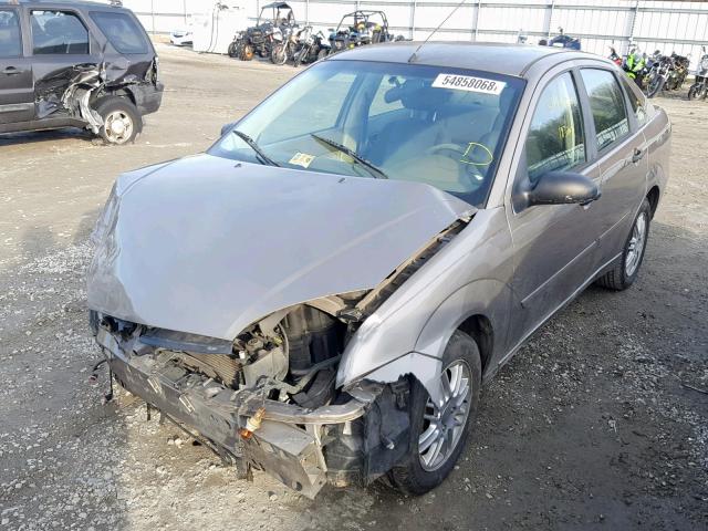 1FAFP34NX5W248490 - 2005 FORD FOCUS ZX4 TAN photo 2