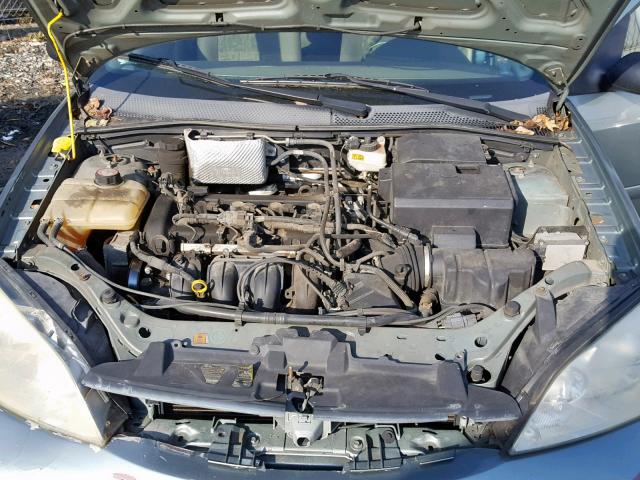 1FAFP34N45W195091 - 2005 FORD FOCUS ZX4 GREEN photo 7