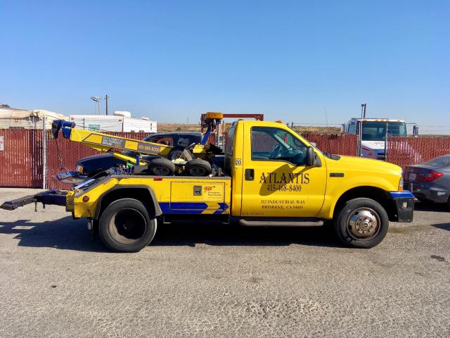 1FDAF56F82EB75903 - 2002 FORD F550 SUPER YELLOW photo 9